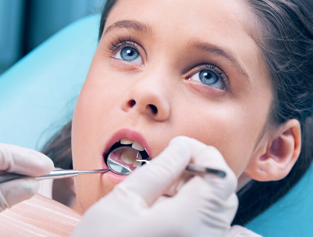 Молочные зубы у детей - стоит ли их удалять?